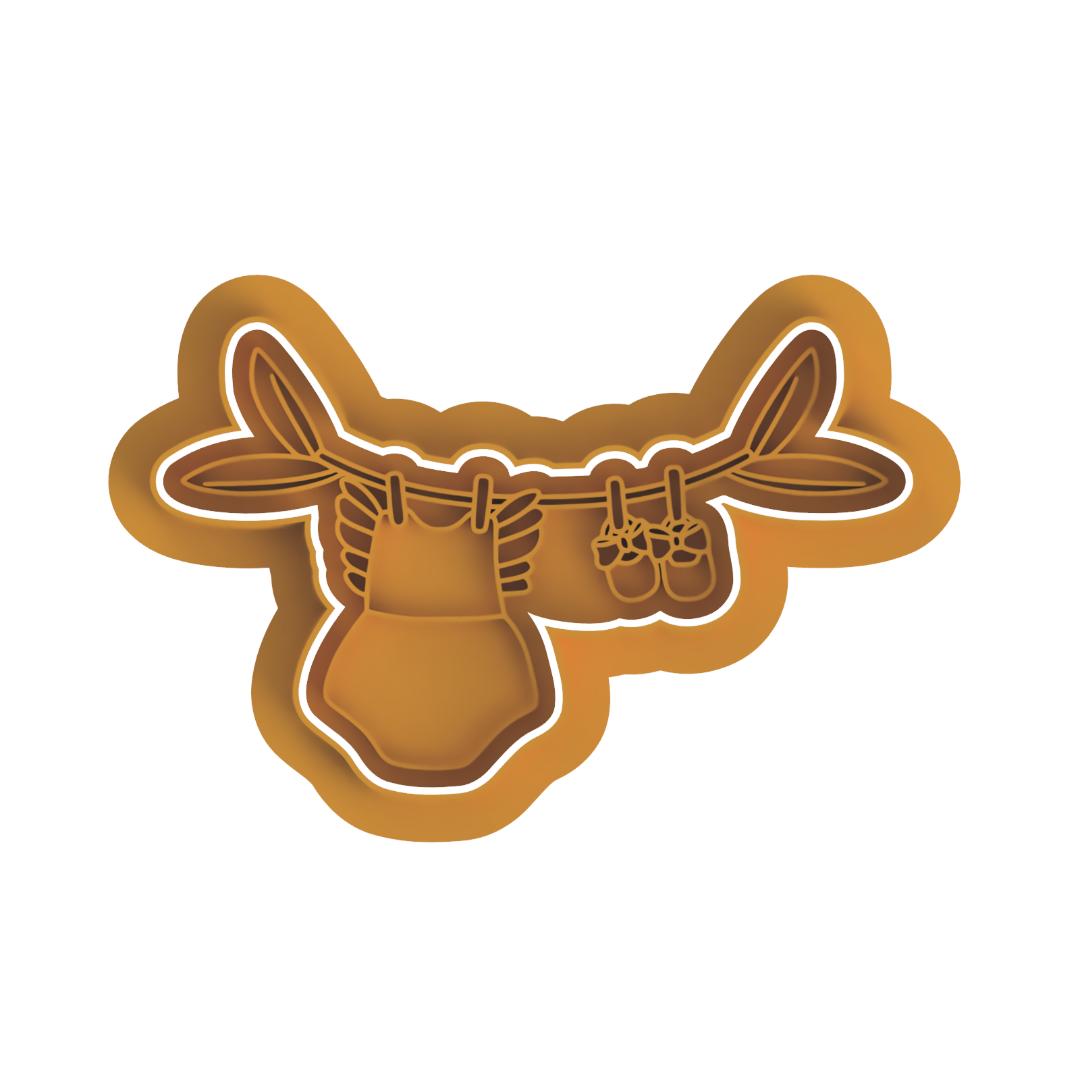 GIRL Romper hanging from branch Cutter & Stamp